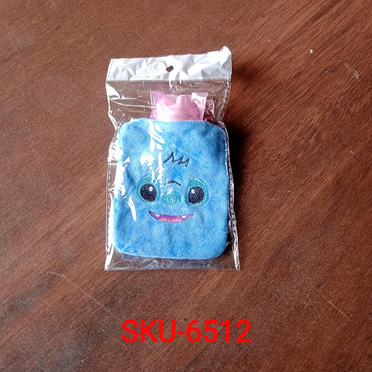 Blue stitch hot water bag with cover, perfect for various pains and cramps Blue stitch hot water bag with cover, perfect for various pains and cramps